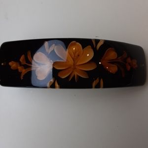 Amber French Barret reverse carved flowers.
